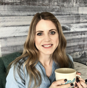 a photo of a woman with a coffee cup